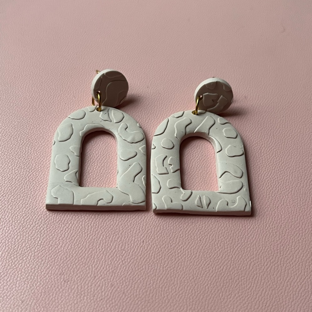 Ivory leopard earrings